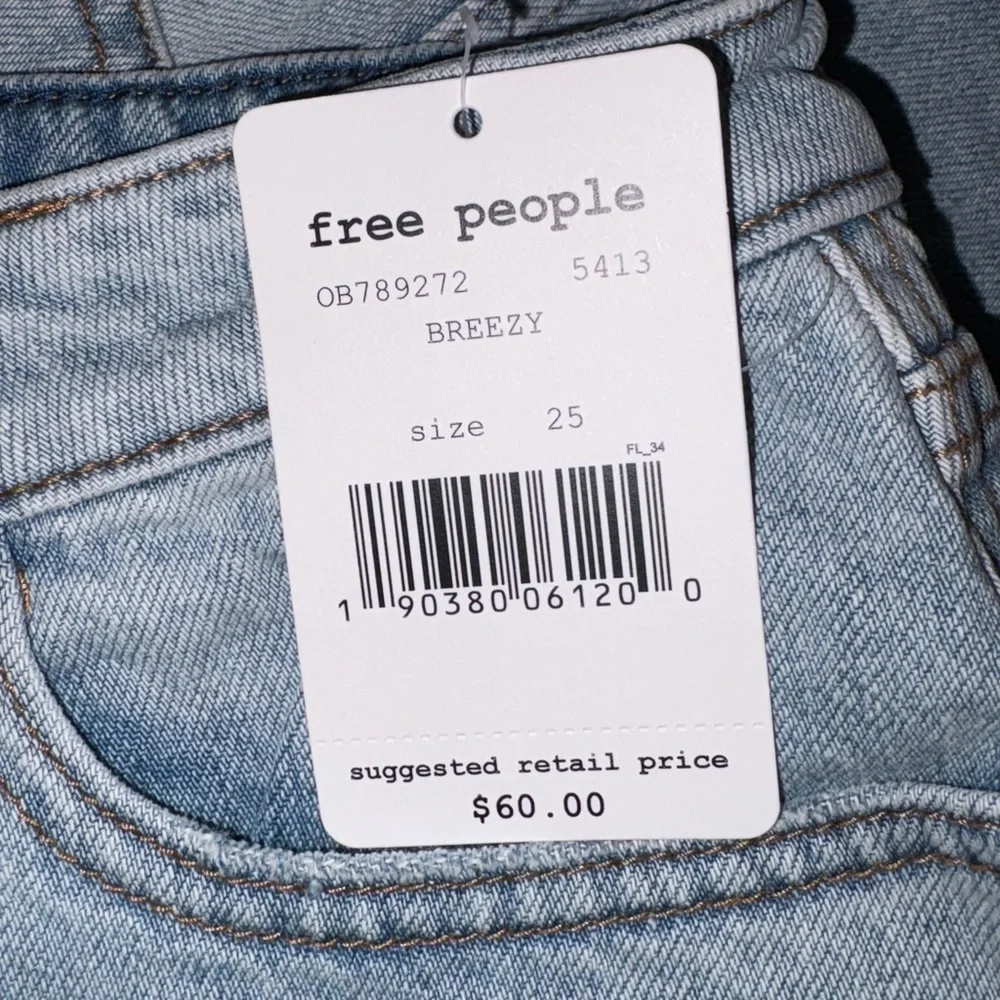 Free People Ripped Denim Mini Skirt in Breezy Blue  100% Cotton Sz. 25 Sz. 0